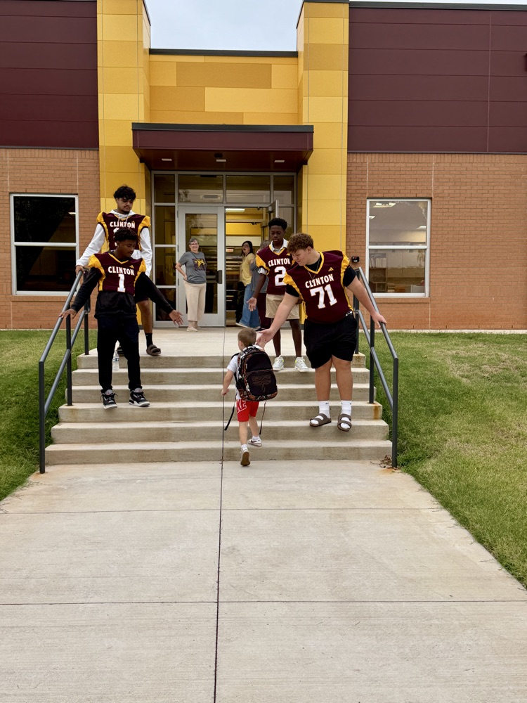 CHS Football team greeting Nance students.