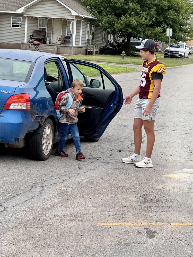CHS Football team greeting Nance students.