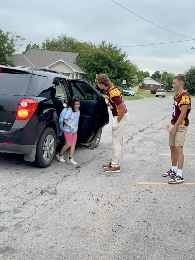 CHS Football team greeting Nance students.