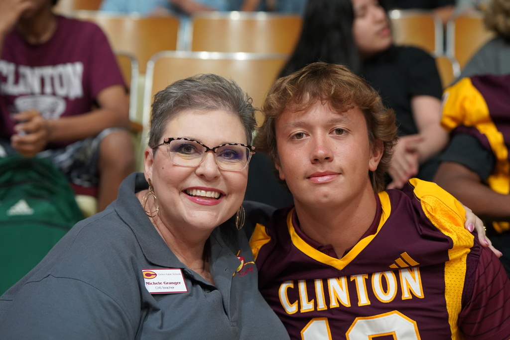 Mrs. Granger and Vince Jones at the pep assembly