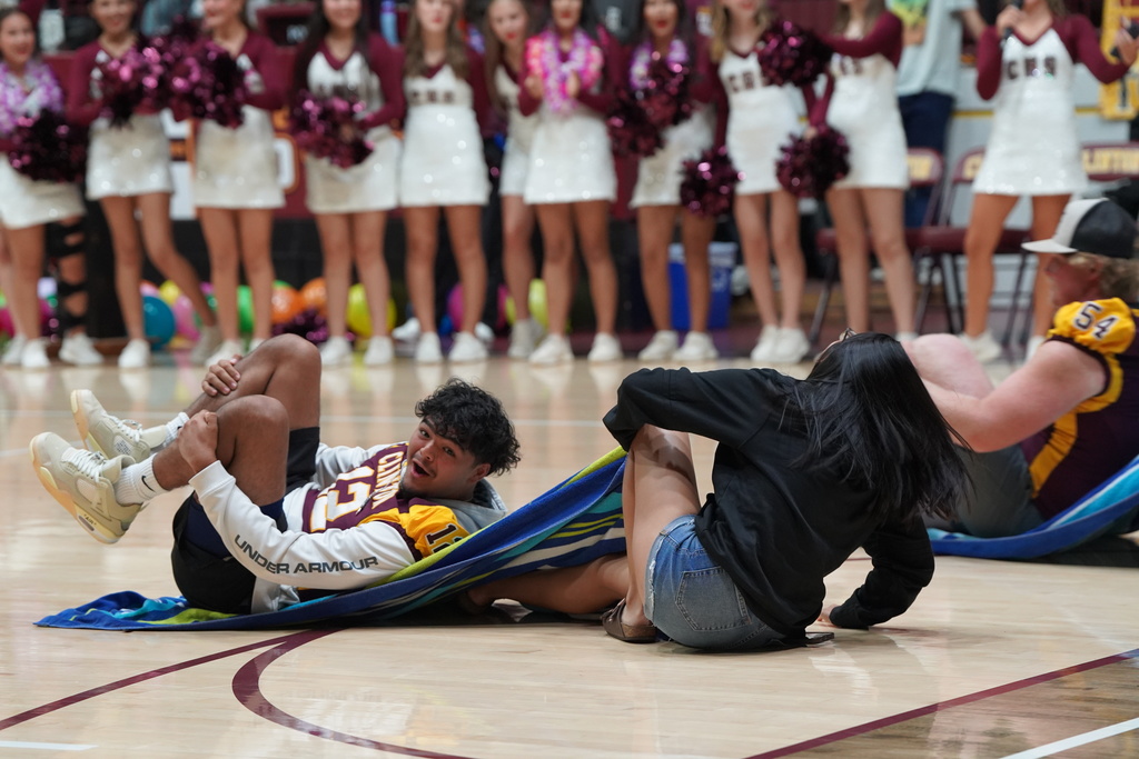 Students playing game at the pep assembly