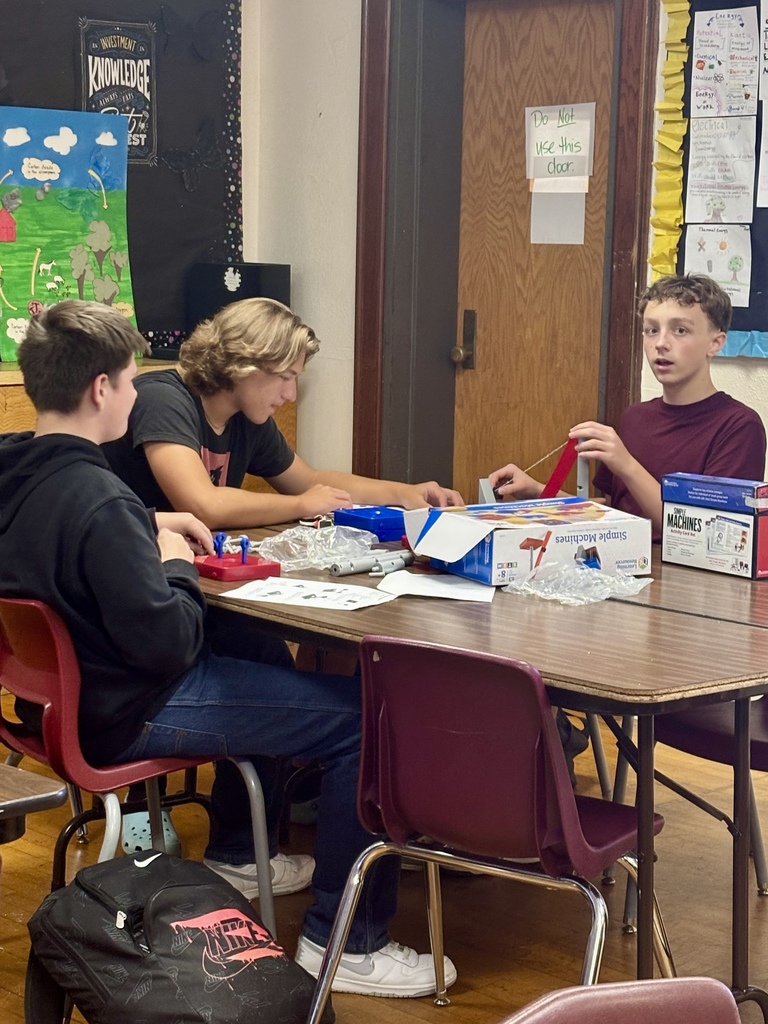 Physical Science students building simple machines