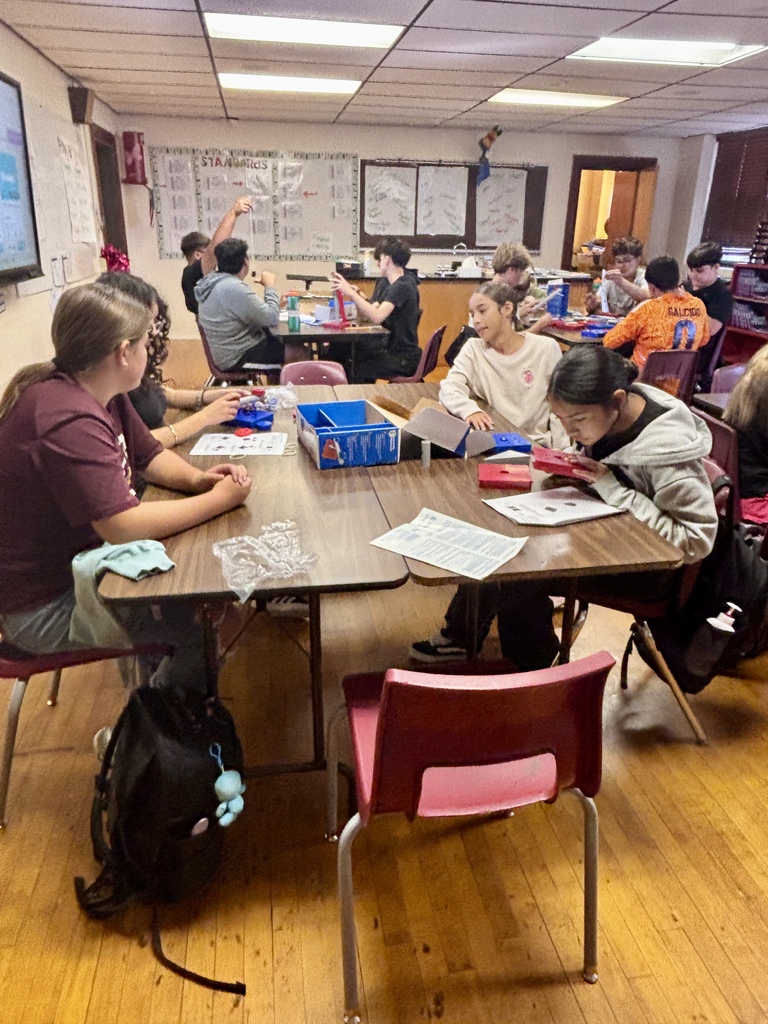 Physical Science students building simple machines