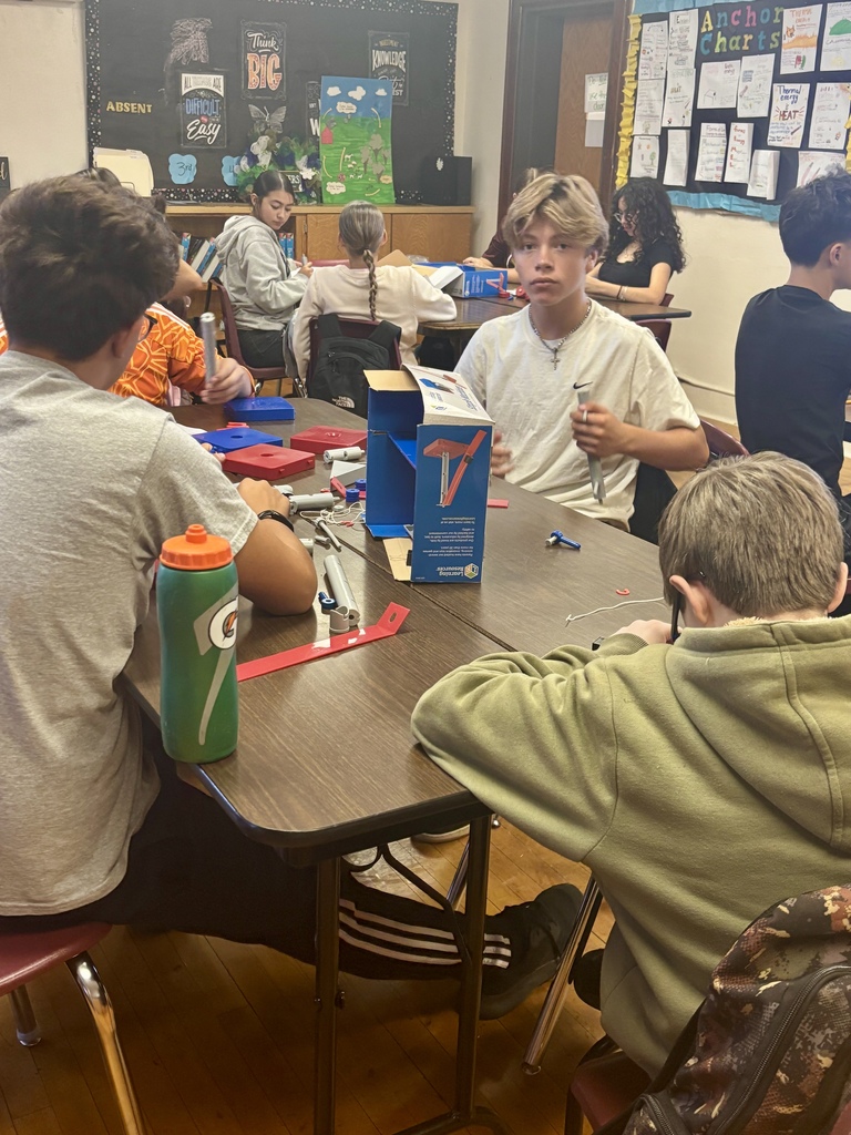 Physical Science students building simple machines