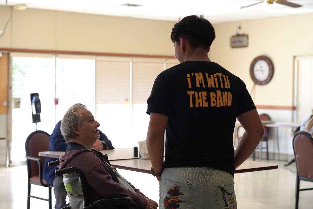 Band students visiting with nursing home residents