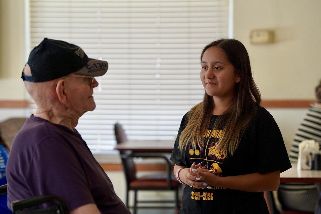 Band students visiting with nursing home residents