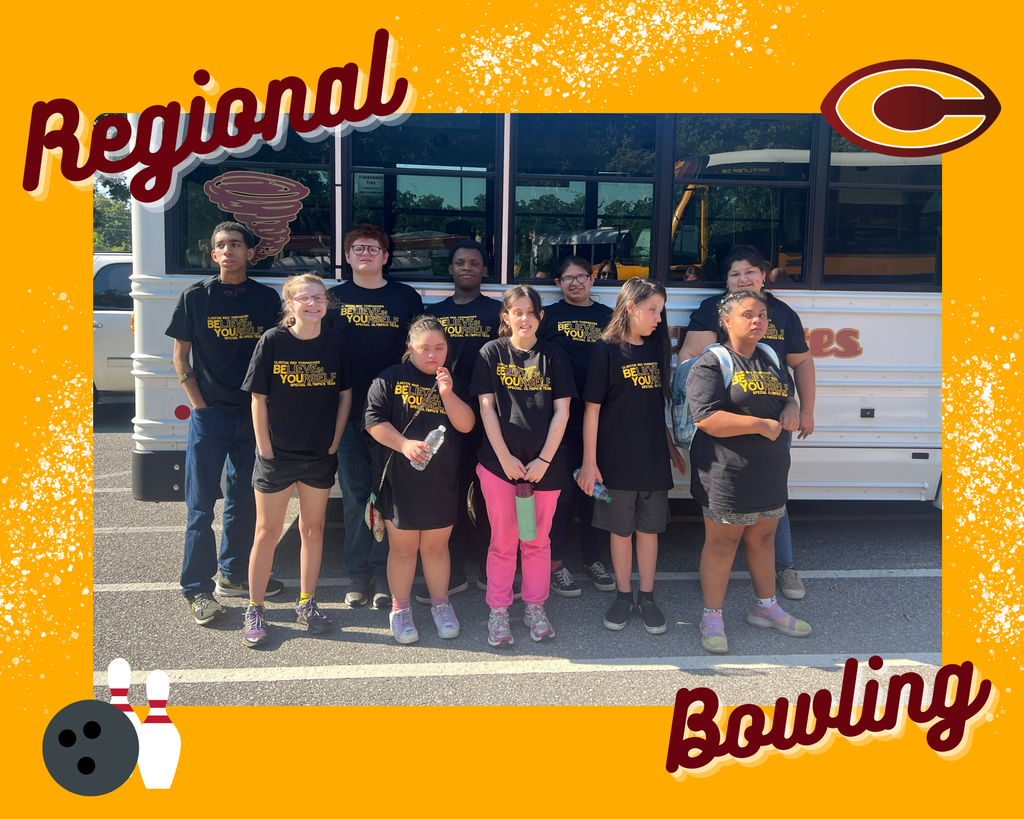 Special Olympics Bowling Team standing in front of the bus