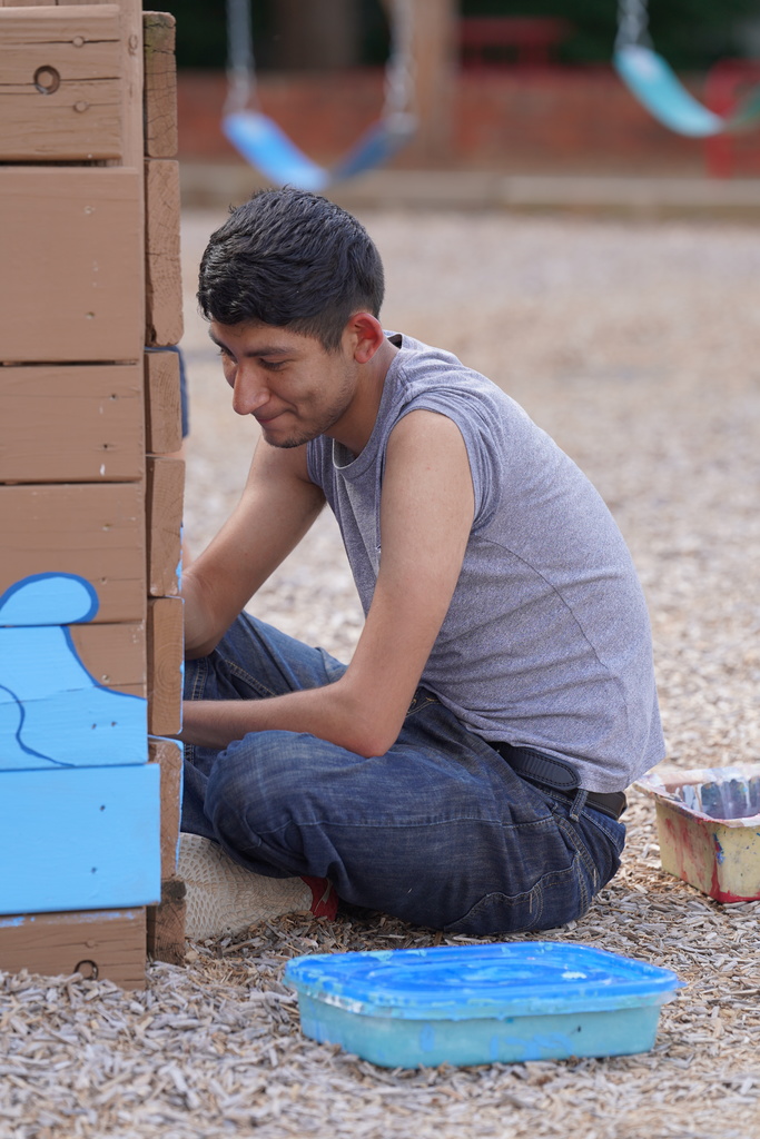 CHS art students painting at Acme Brick Park