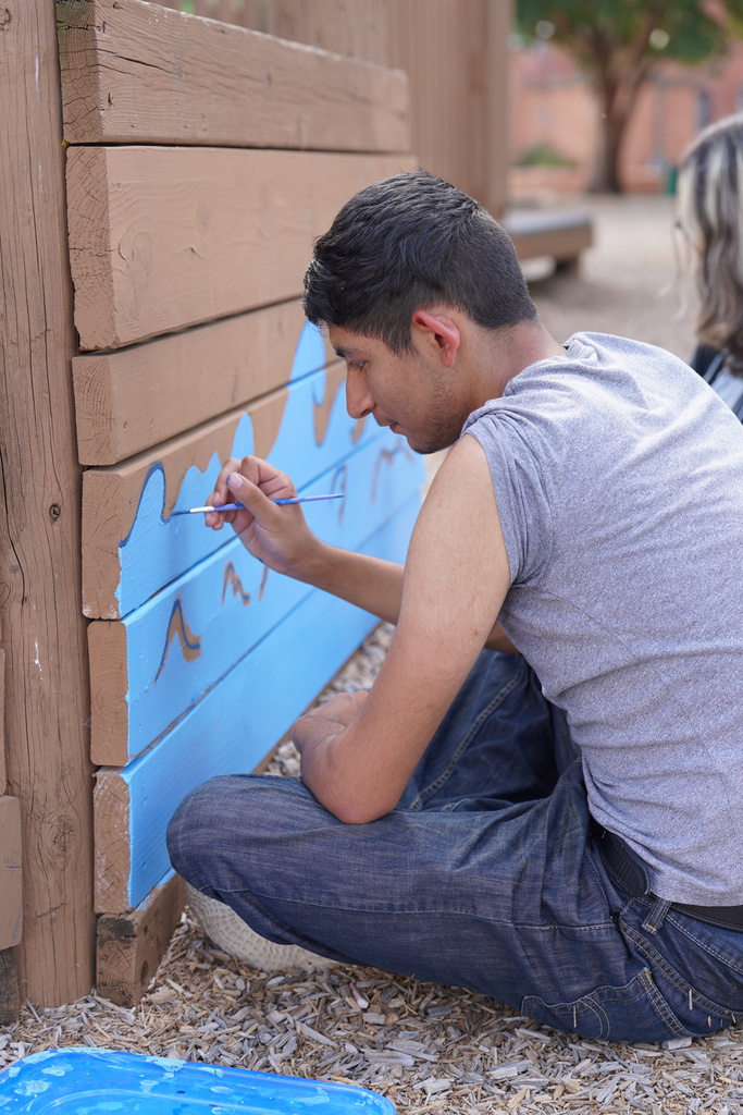 CHS art students painting at Acme Brick Park