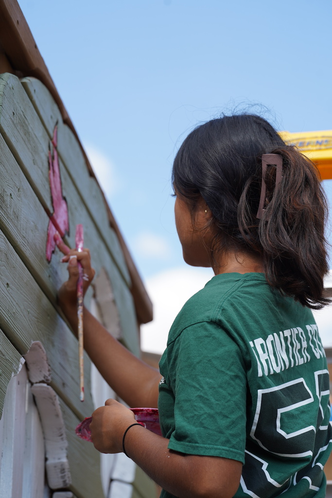 CHS art students painting at Acme Brick Park
