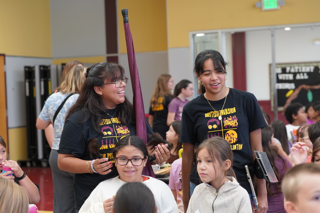 CHS Band students talking to SW student