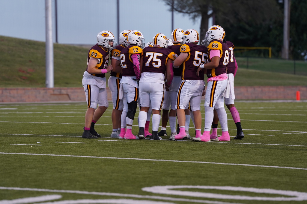 Team Huddle during Pink Out