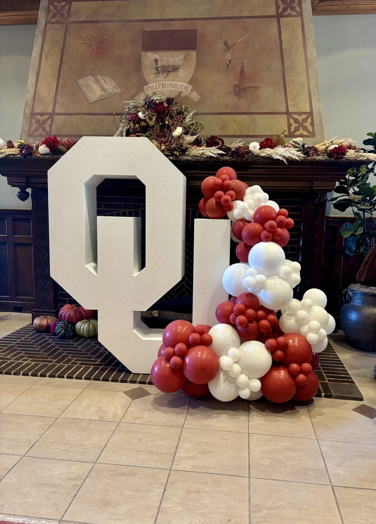 OU logo with red and white balloons 