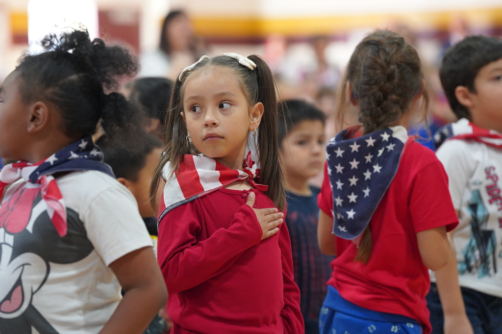 Nance student with hand over heart