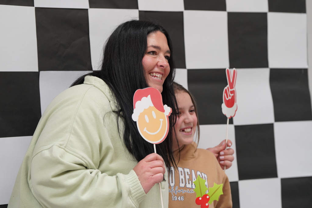Teacher and student in the photo op at Southwest Family Art Night