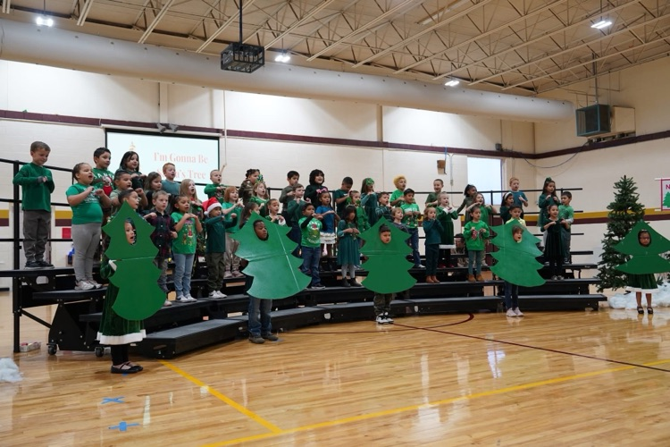 Nance students singing at their Christmas program.