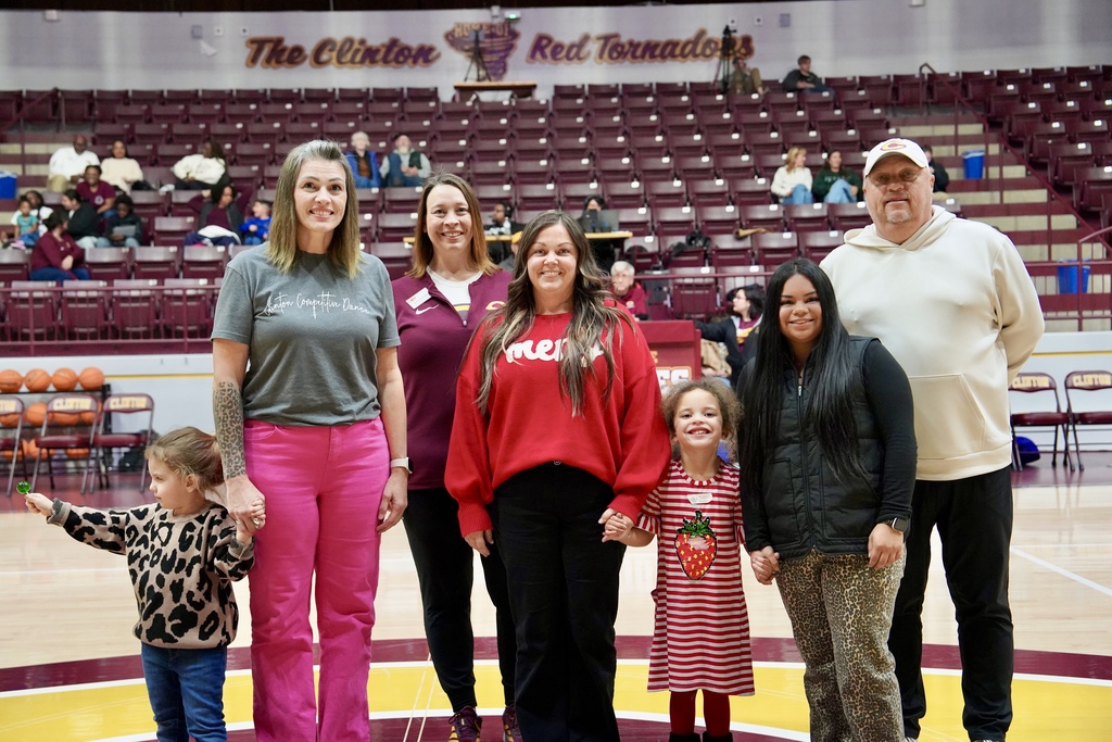 Educator of the Game Summer Morgan with CHS Principal Michelle Sorter and Assistant Superintendent Melissa Knabe, Assistant Principal Brent Caldwell, and her daughters Margot and Chloe.