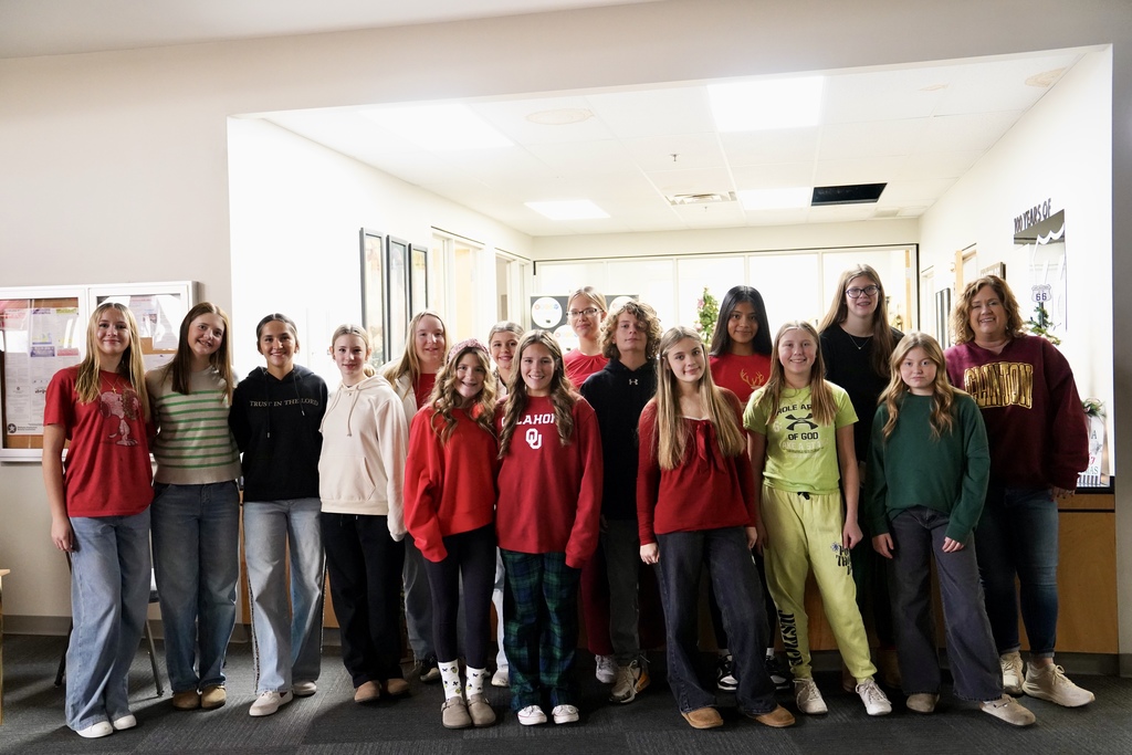 CMS Stu-Co caroling at the Clinton Chamber of Commerce with Julie Caldwell