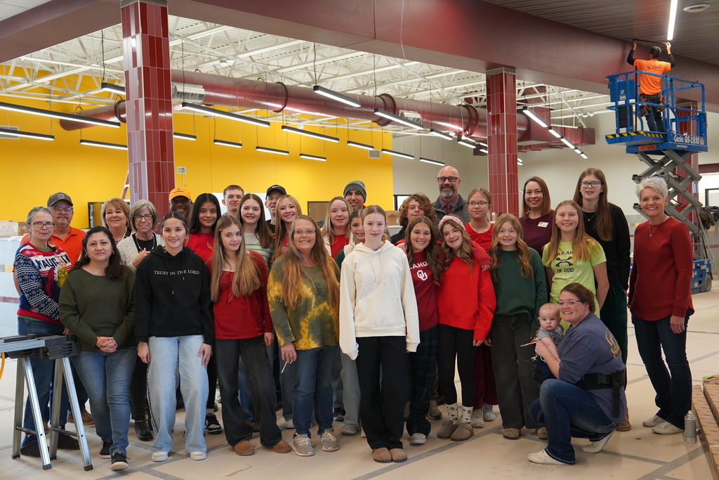 CMS Stu-Co caroling at the new CMS