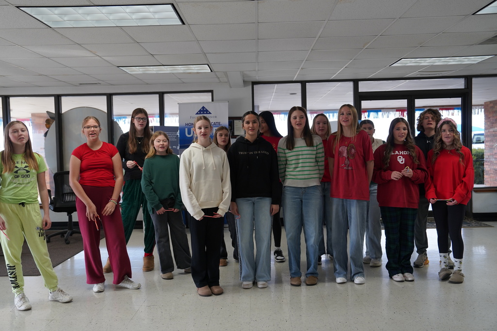 CMS Stu-Co caroling at McKinsey Motors