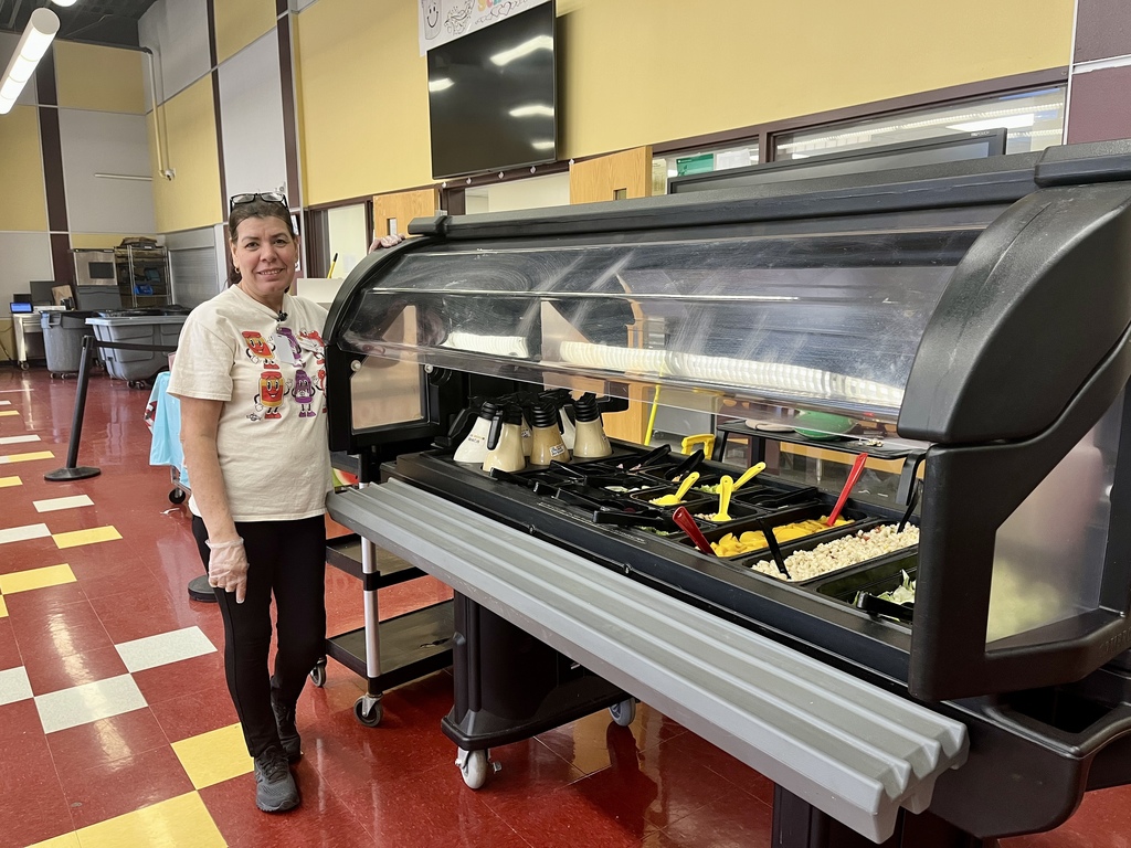 Kitchen staff and salad bar