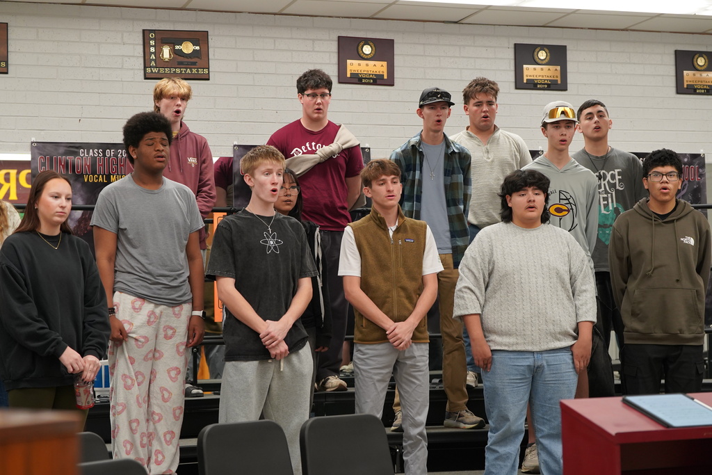 Bass and tenors rehearsing