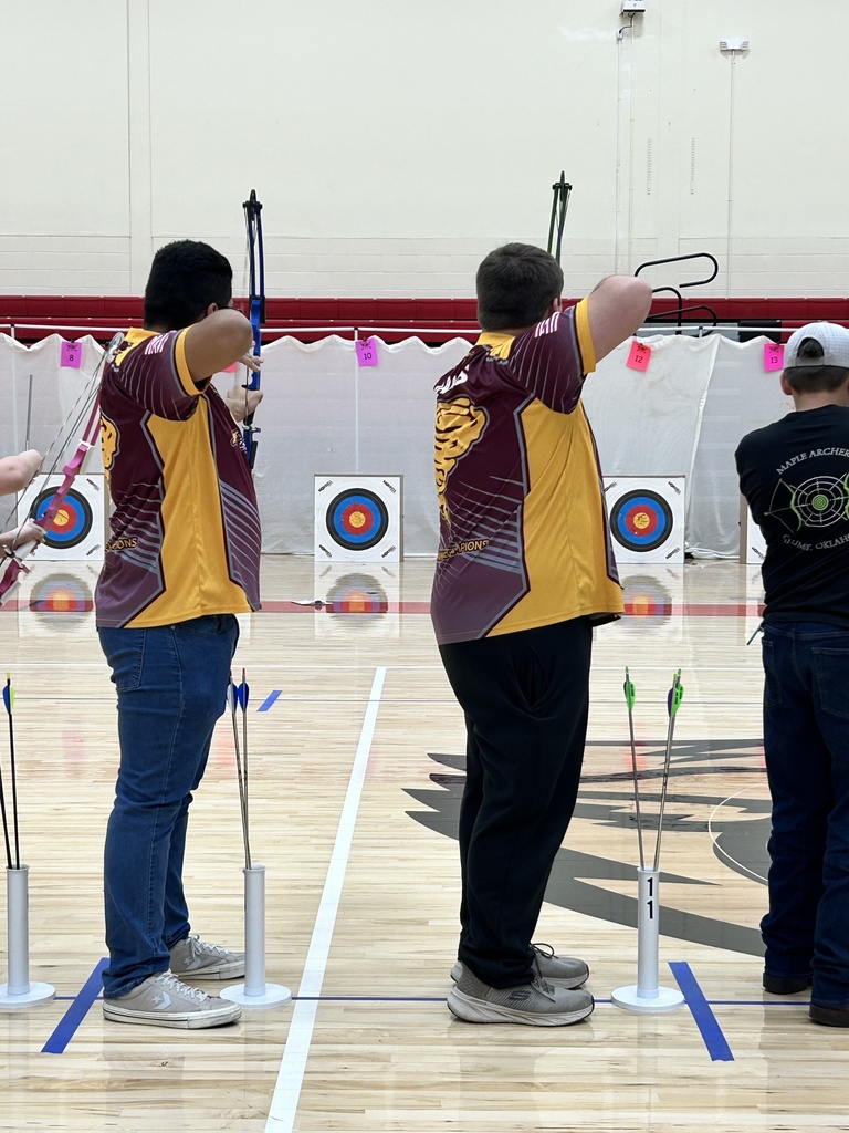 Archery students ready to shoot.