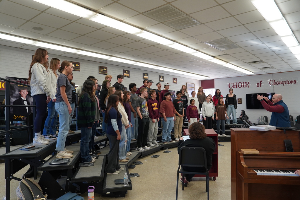CHS Choir on risers with Dr. Graves
