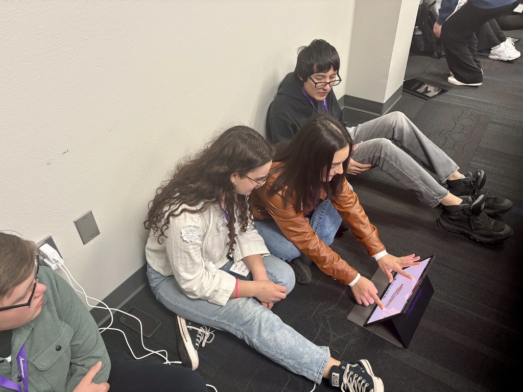 Anatomage team studying before the competition