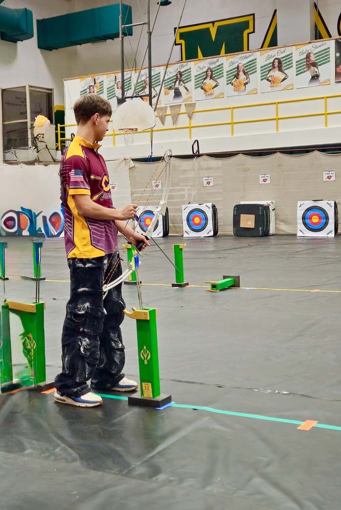 Julian Hayes getting his bow ready to shoot