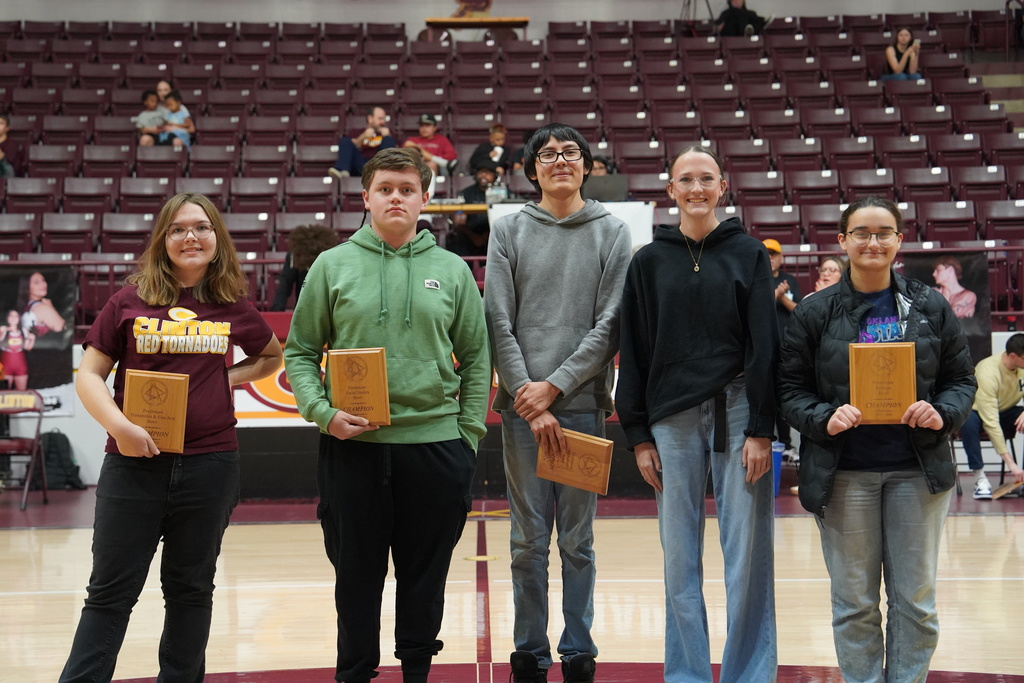 Froshmore Academic Team standing on the basketball court