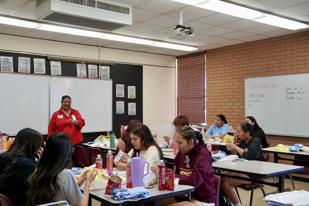 Students enjoying a snack in the classroom