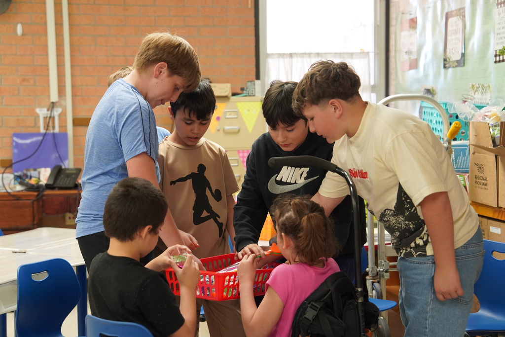 GT students handing out prizes