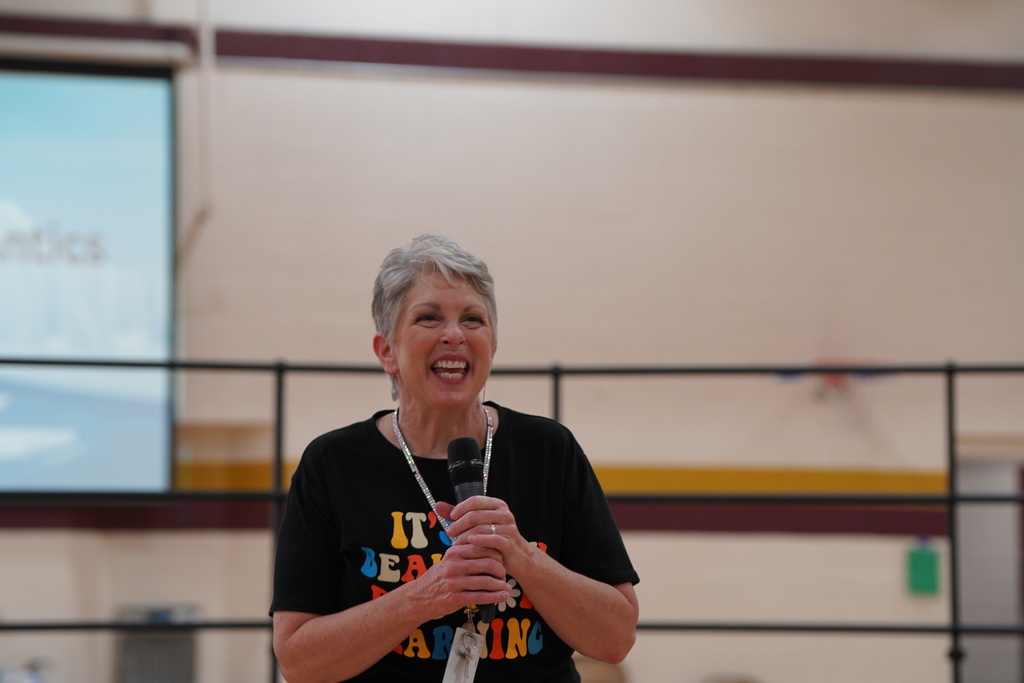 Mrs. Daubenspeck talking to families at the Kindergarten program