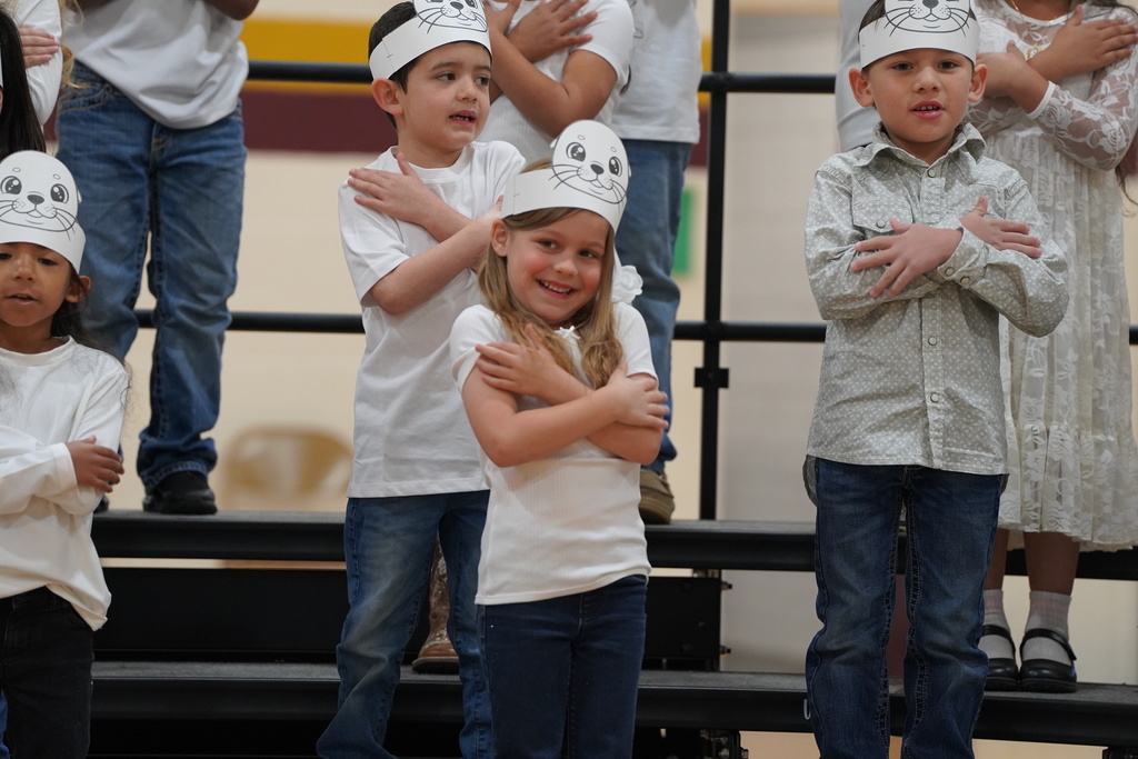 Student smiling in seal hat