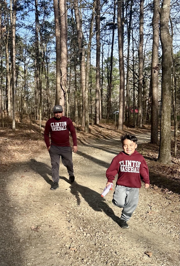 Student running on a trail