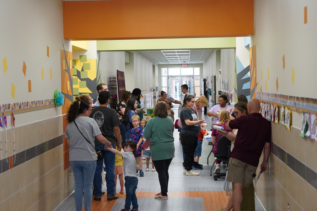 Families waiting to enroll at Nance