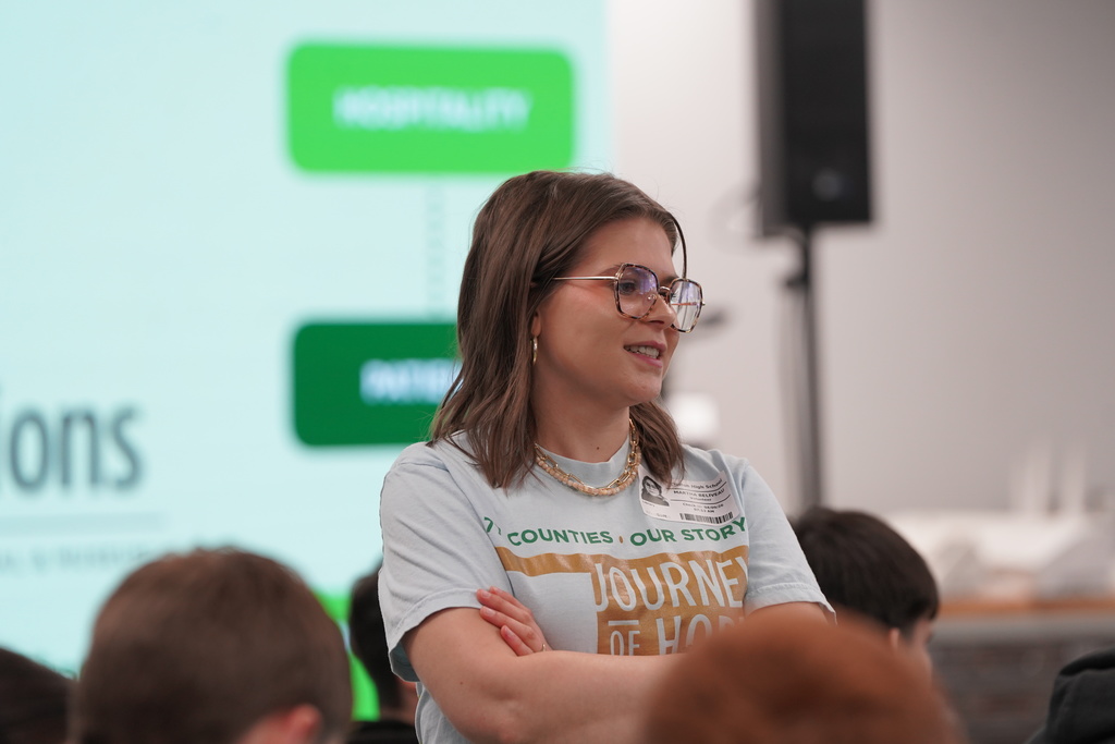 Journey of Hope presenter smiling at students