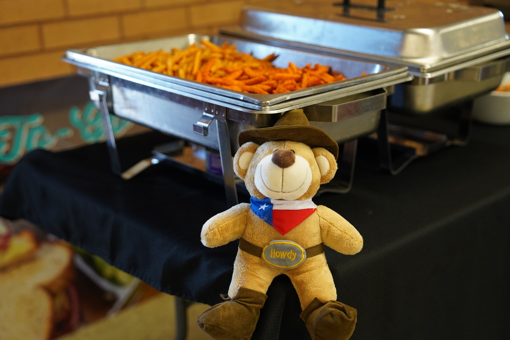 Stuffed bear in front of sweet potato fries