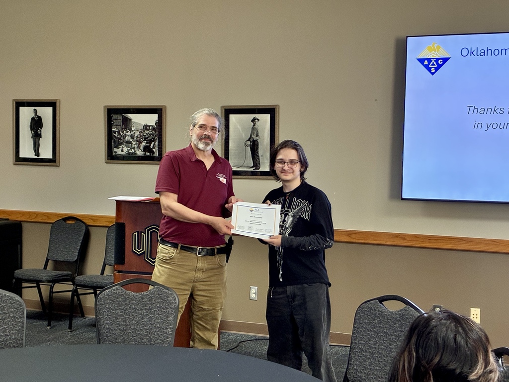 Student receiving chemistry award