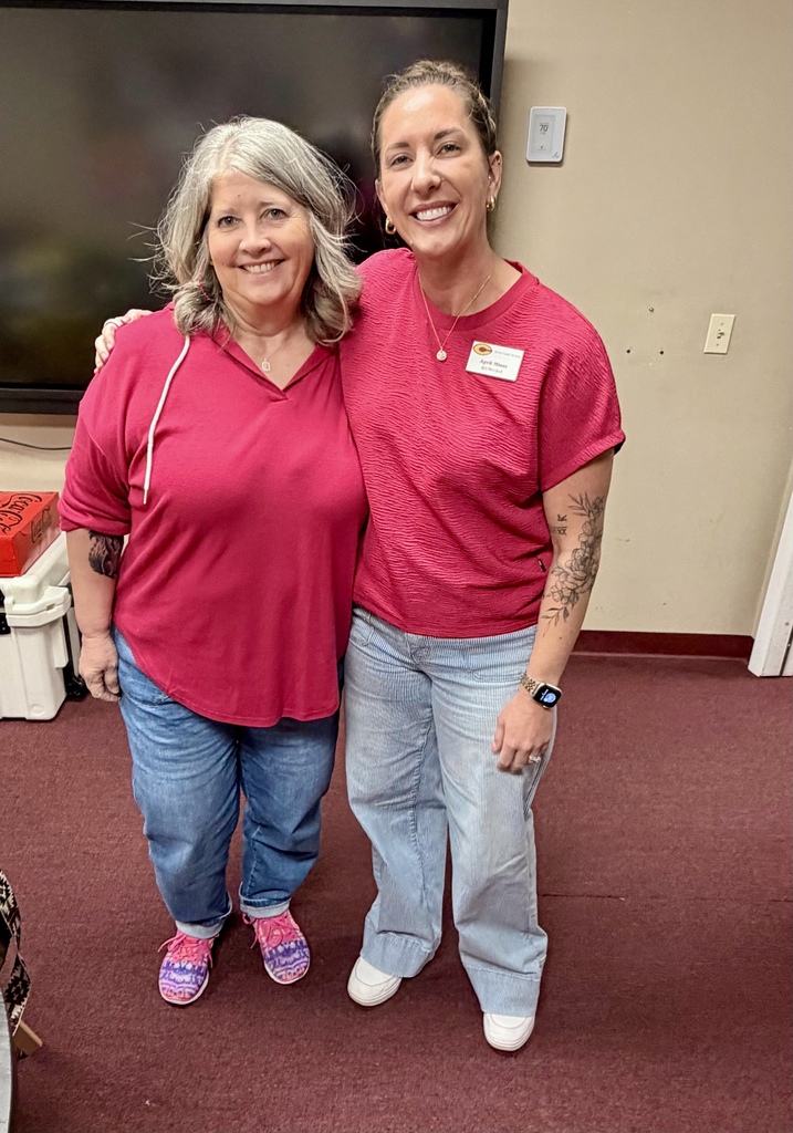 Principal wearing pink