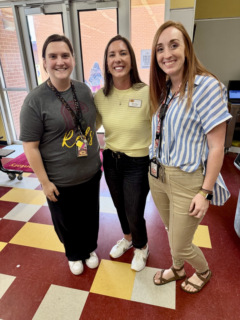 Teachers posing with our amazing principal