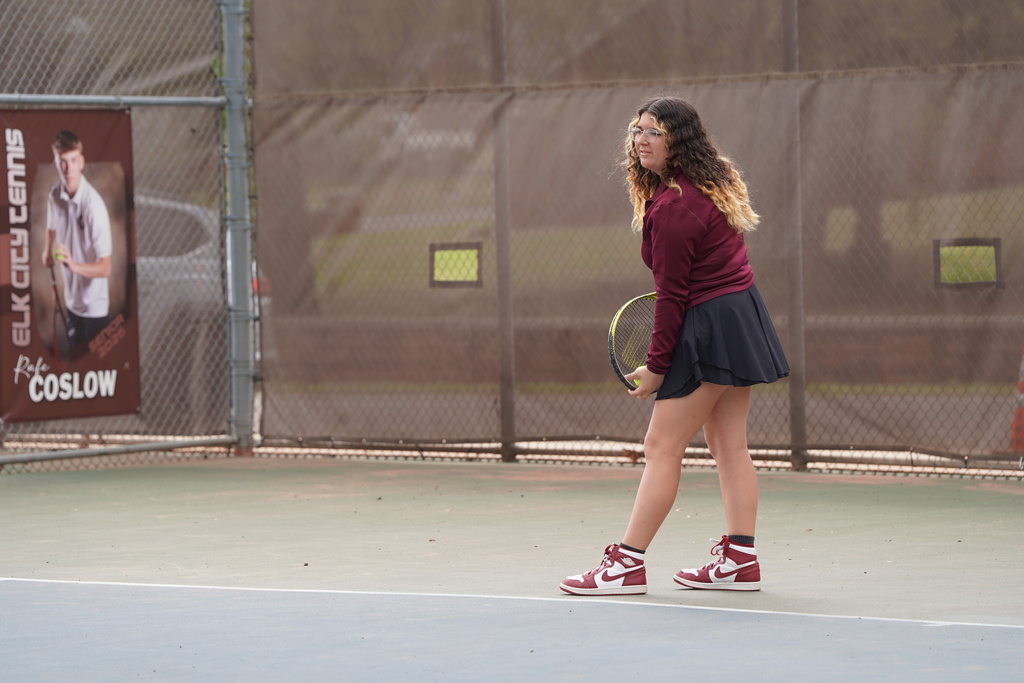Lady Reds Tennis player ready to serve
