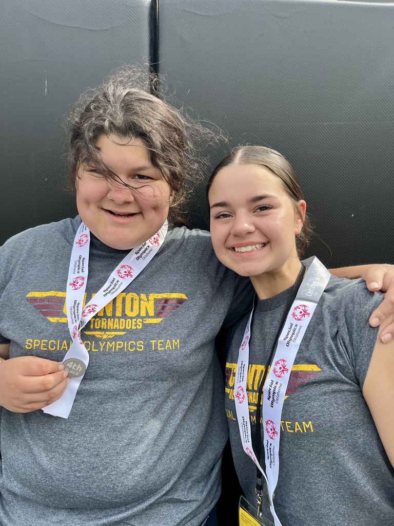 Special Olympics team members smiling 