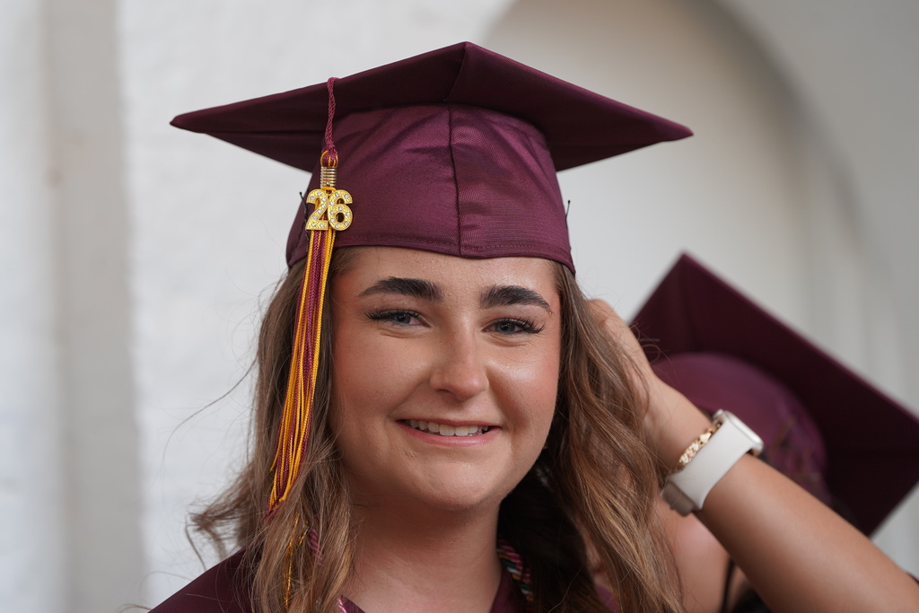 Female graduate smiling