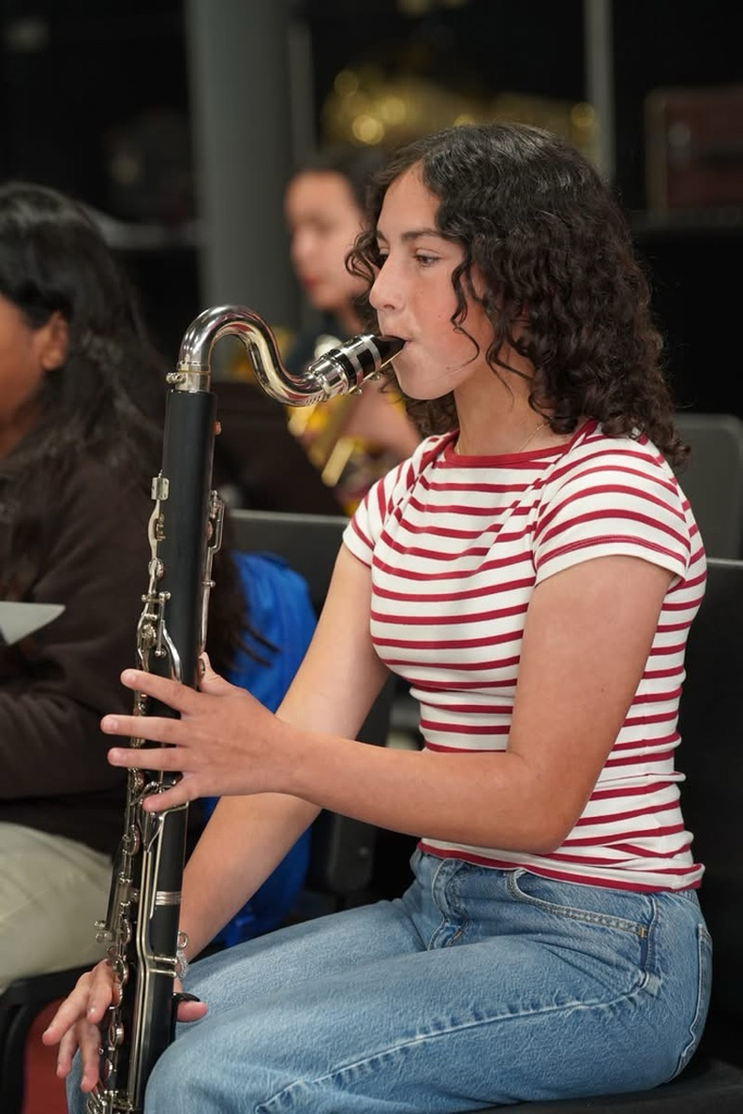 6th grade band member playing instrument