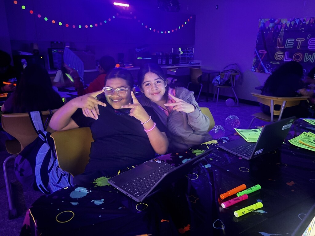 Students in glow classroom