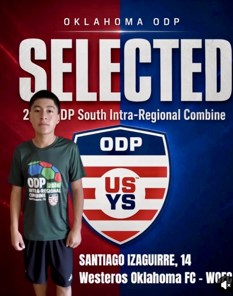 Oklahoma ODP Soccer Player standing in front of sign