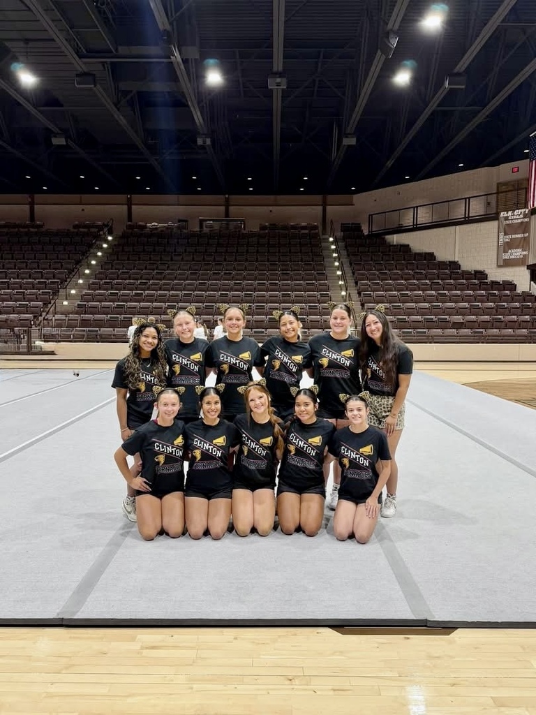 CHS Cheer posing in the their black uniform