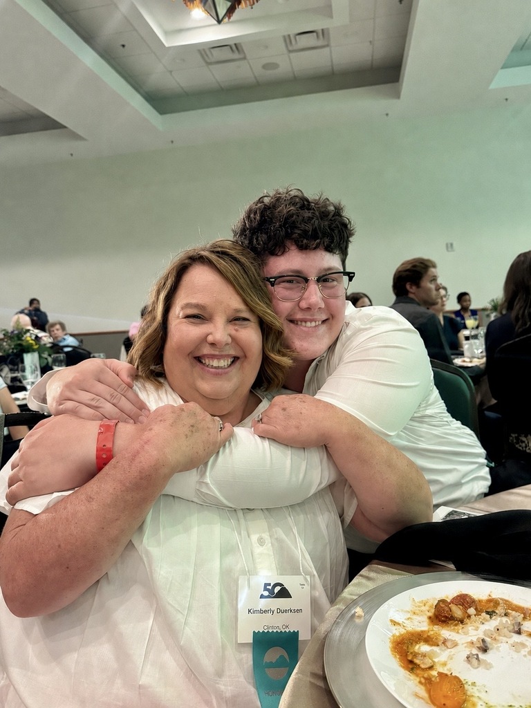 Student and teacher at banquet